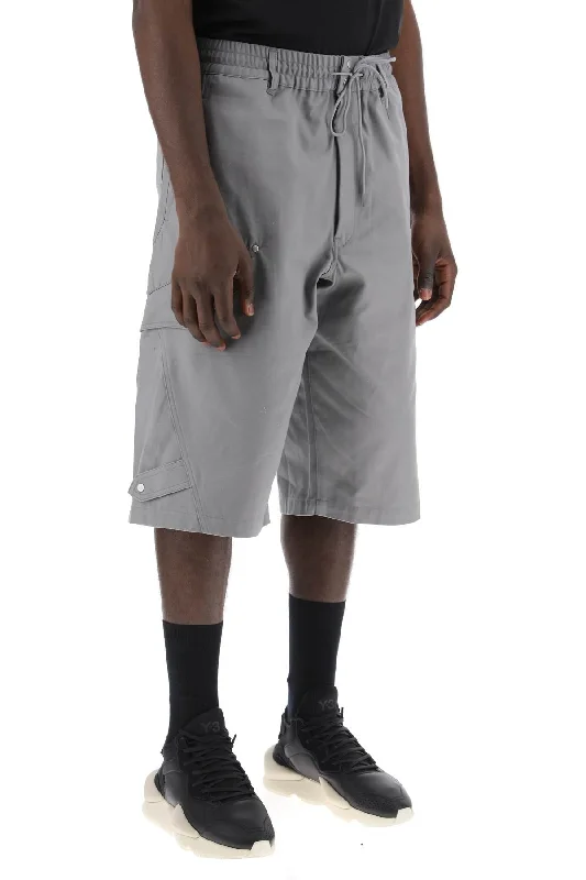 Simple Style Y-3 Canvas Multi-Pocket Bermuda Shorts.